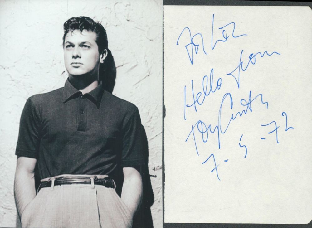 Lot 344: Tony Curtis signed album page. Dedicated. Good condition....