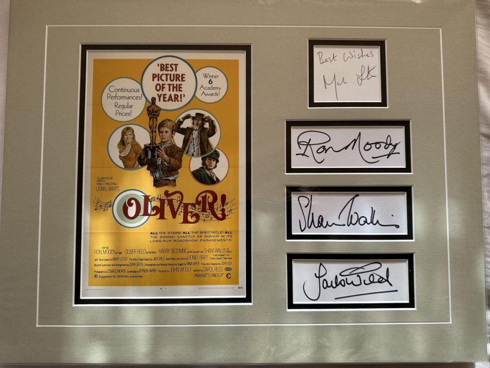 Lot 591: Oliver! VERY rare cast signed display consisting of...