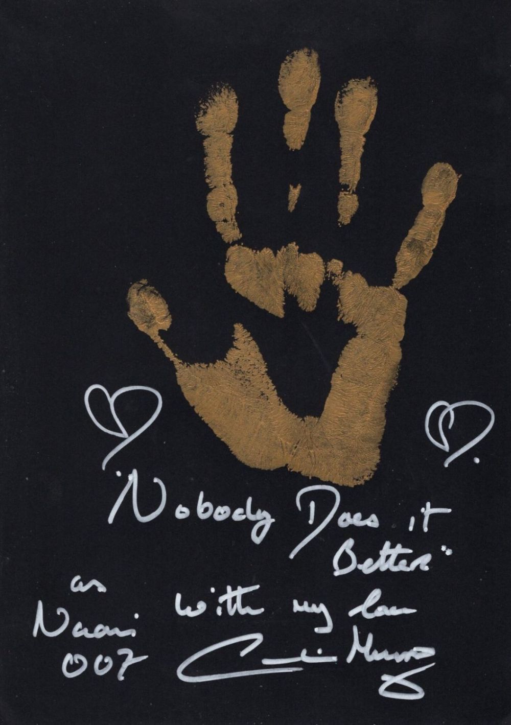 Lot 595: 007 James Bond art 8x12 inch black card...