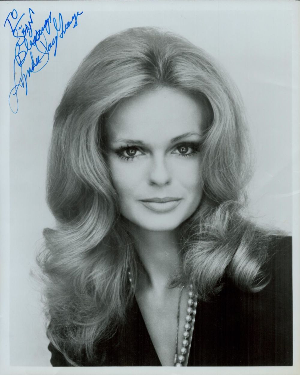 Lot 102: Lynda Day George signed 10x8 inch black and...
