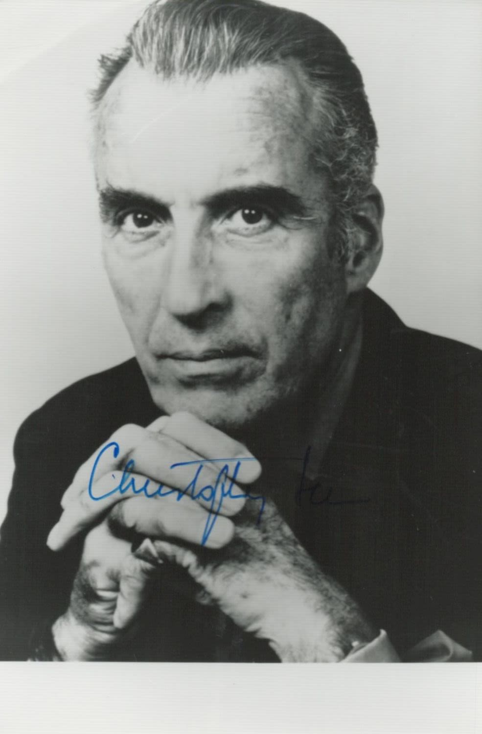 Lot 227: Christopher Lee signed 6x4 inch black and white...