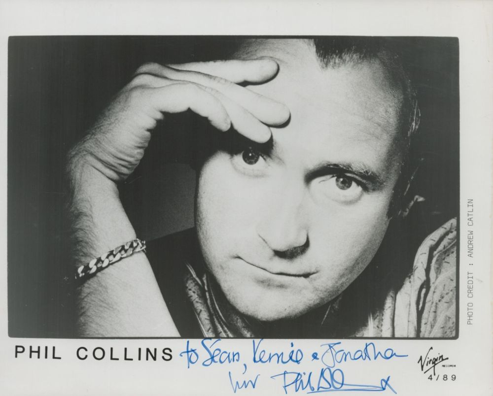 Lot 230: Phil Collins signed 10x8 inch black and white...