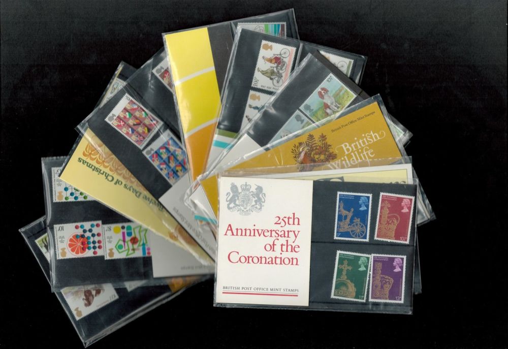 Lot 55: Post office mint Stamp Pack Collection includes 25th...
