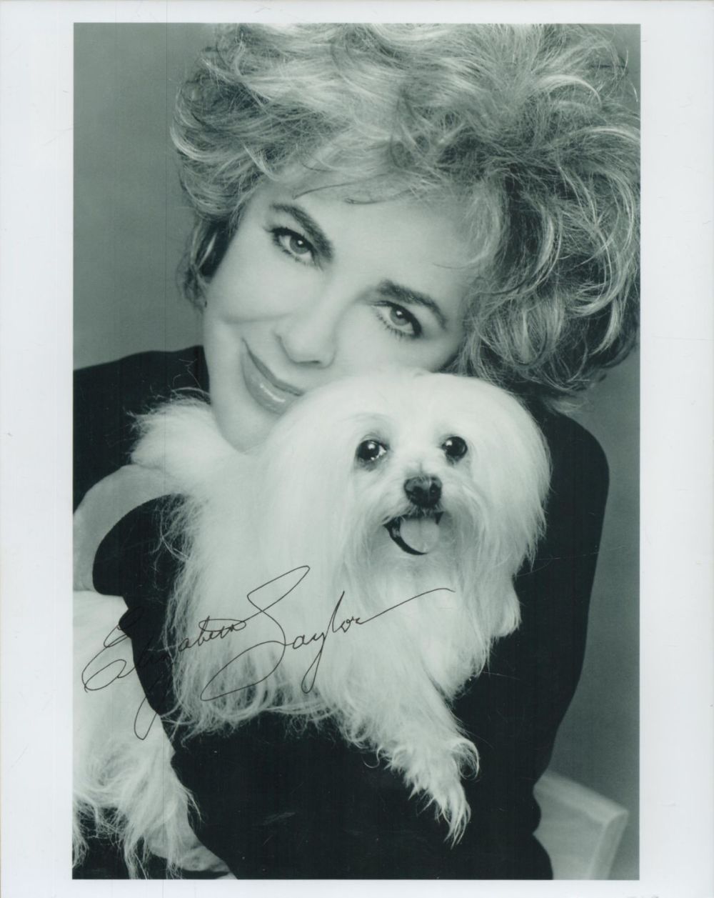 Lot 77: Elizabeth Taylor signed 10x8 inch black and white...