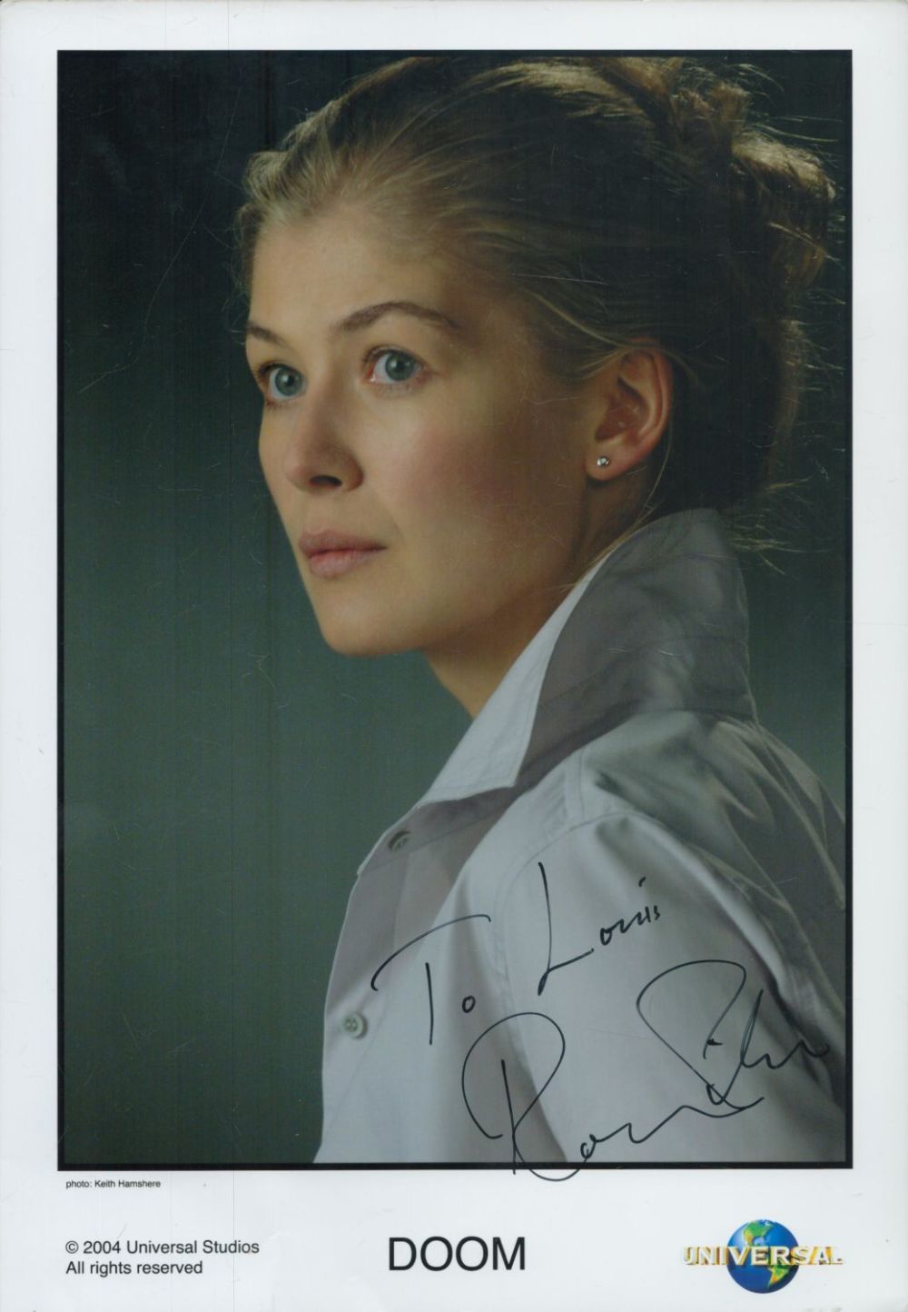 Lot 83: Rosamund Pike signed 12x8 inch Doom colour promo...