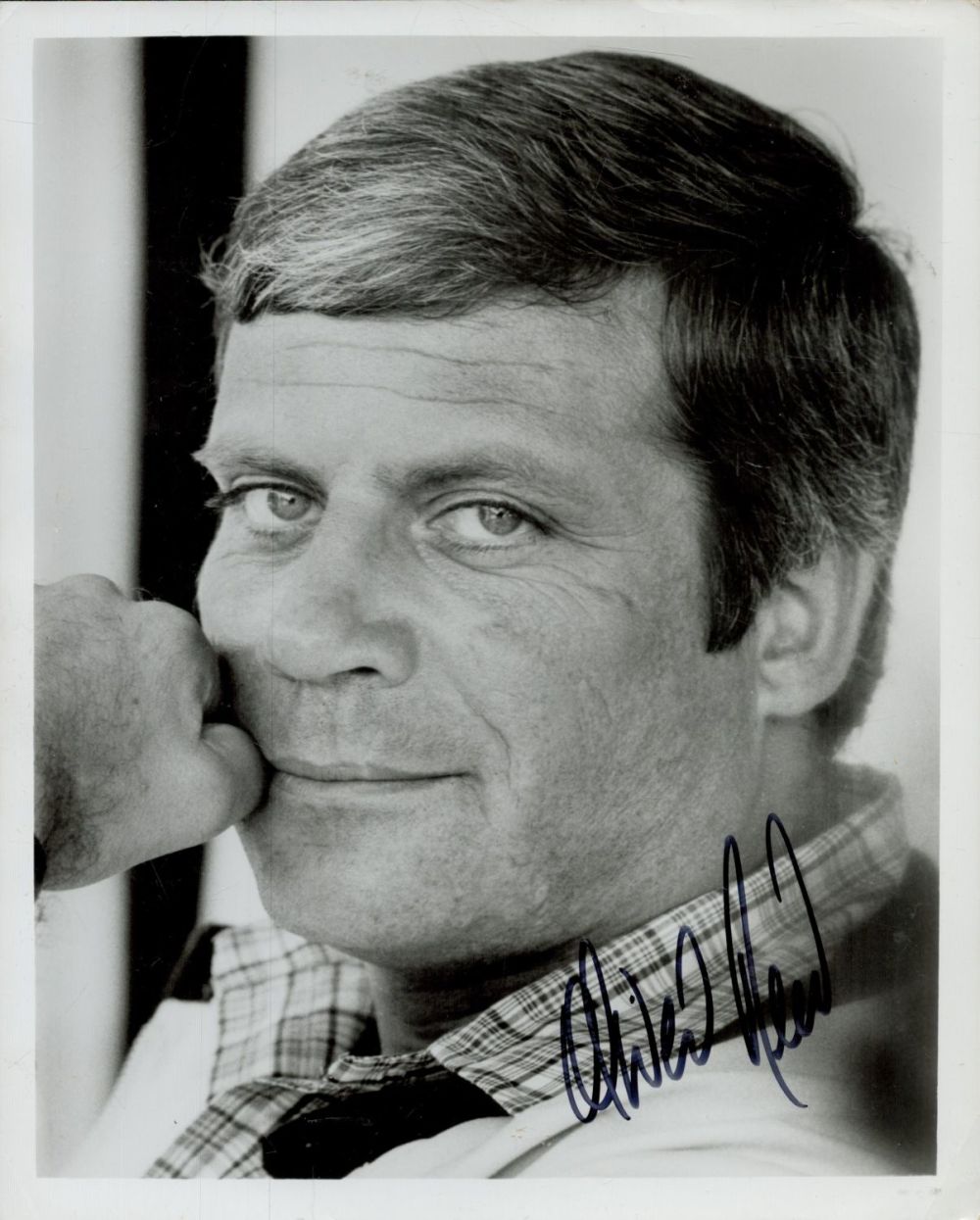 Lot 114: Oliver Reed signed 10x8 inch black and white...