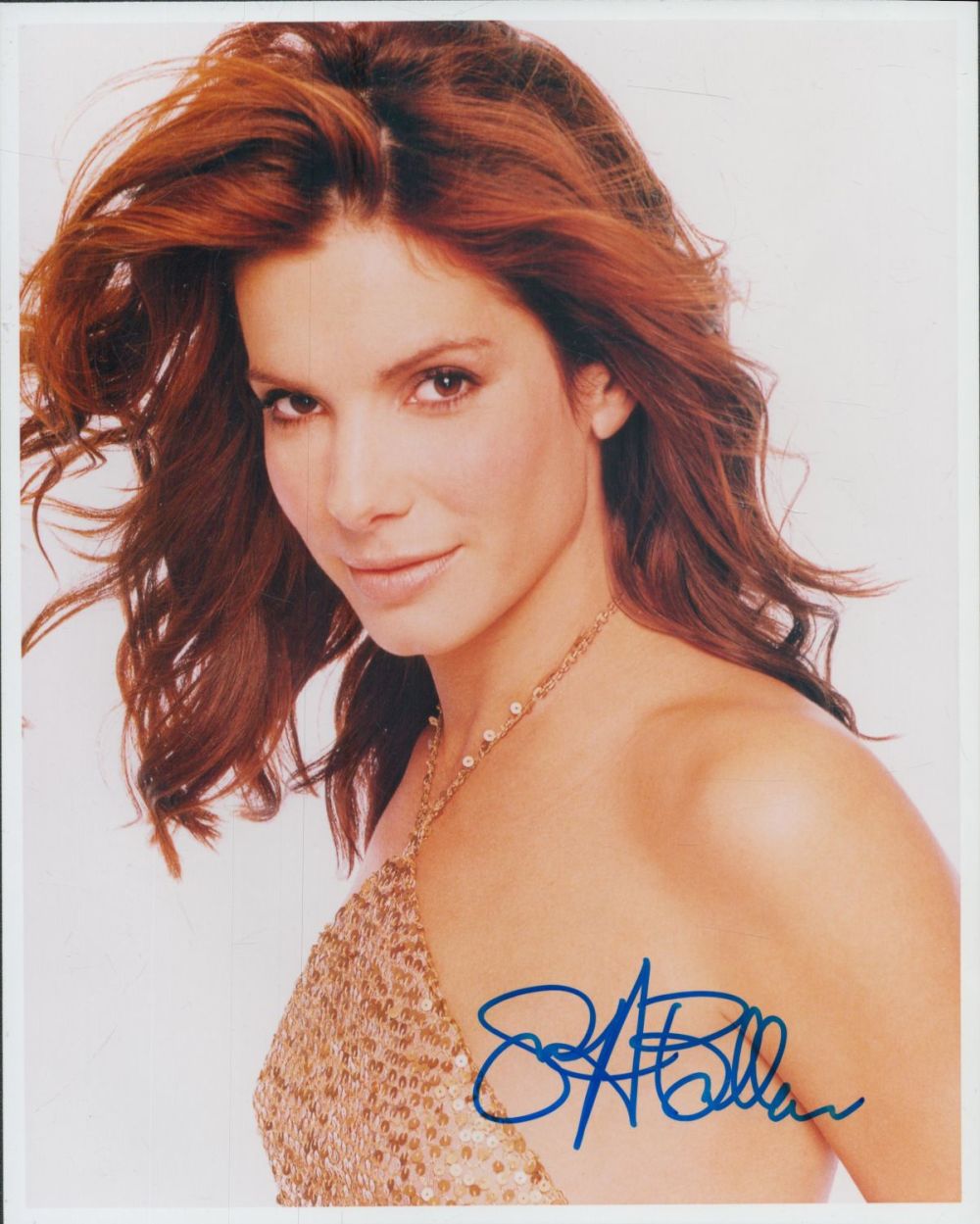 Lot 135: Sandra Bullock signed 10x8inch colour photo. Good Condition....