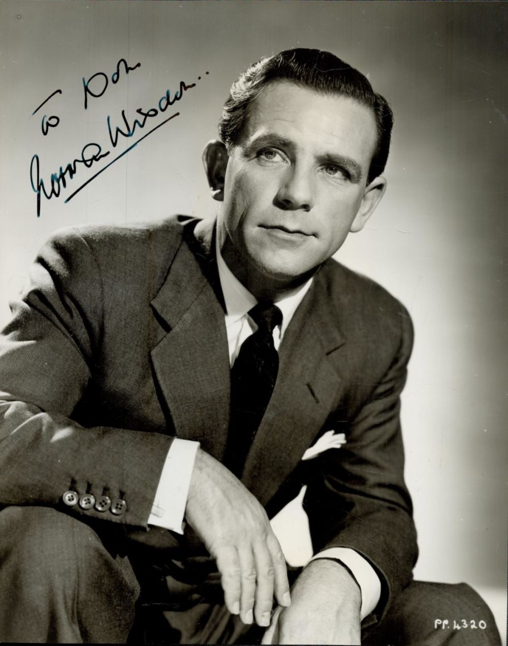 Lot 151: Norman Wisdom signed 10x8inch black and white photo....