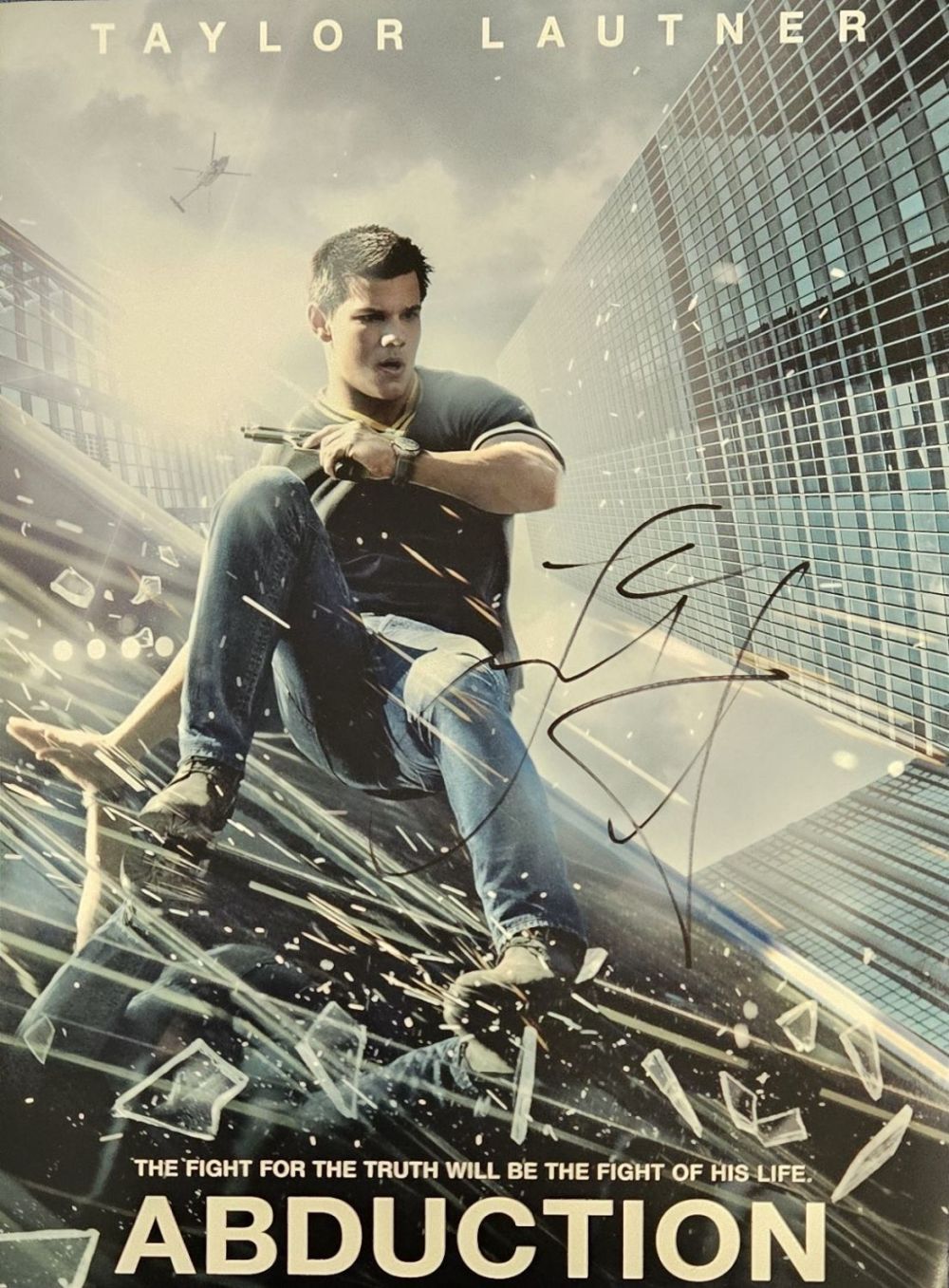 Lot 195: Taylor Lautner signed Abduction 16x12inch colour poster photo....