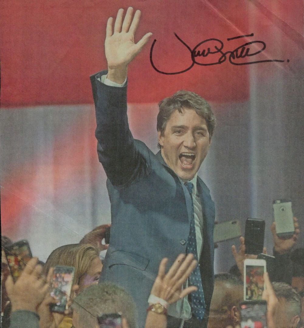 Lot 220: Justin Trudeau signed 6x6 inch colour magazine photo....