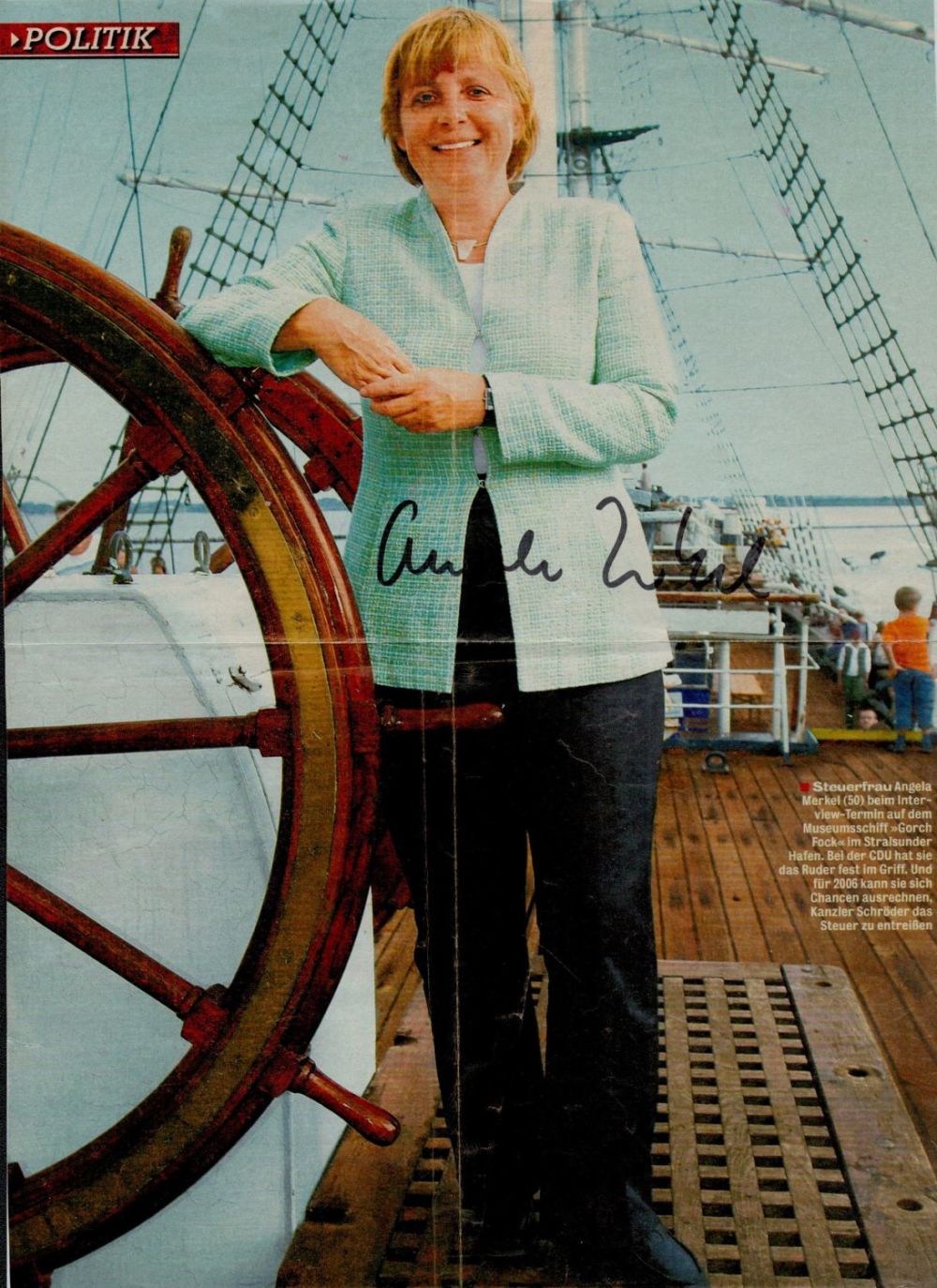 Lot 237: Angela Merkel signed 12x8 inch vintage colour magazine...
