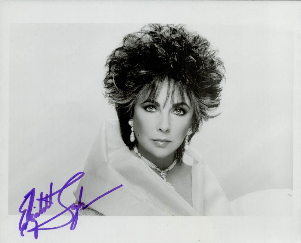 Lot 421: Elizabeth Taylor signed 10x8" black and white photo....