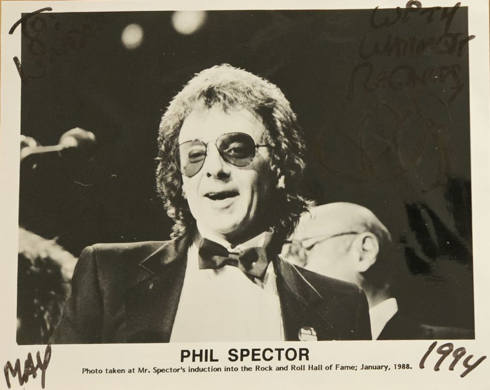 Lot 422: Phil Spector signed 10x8" black and white photo,...