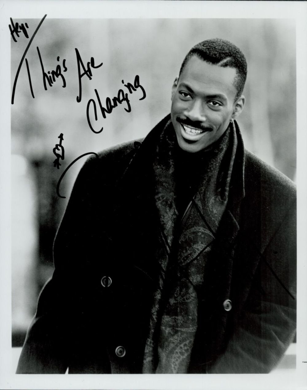 Lot 423: Eddie Murphy signed 10x8" black and white photo,...