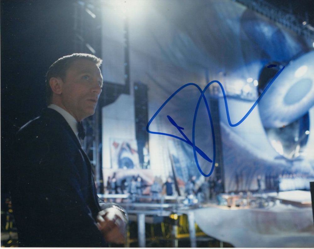 Lot 669: 007 James Bond 8x10 inch photo signed by...