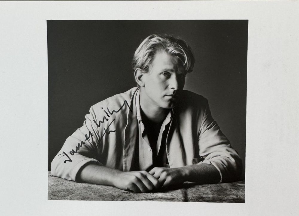 Lot 476: James Wilby signed 7x5inch black and white photo....