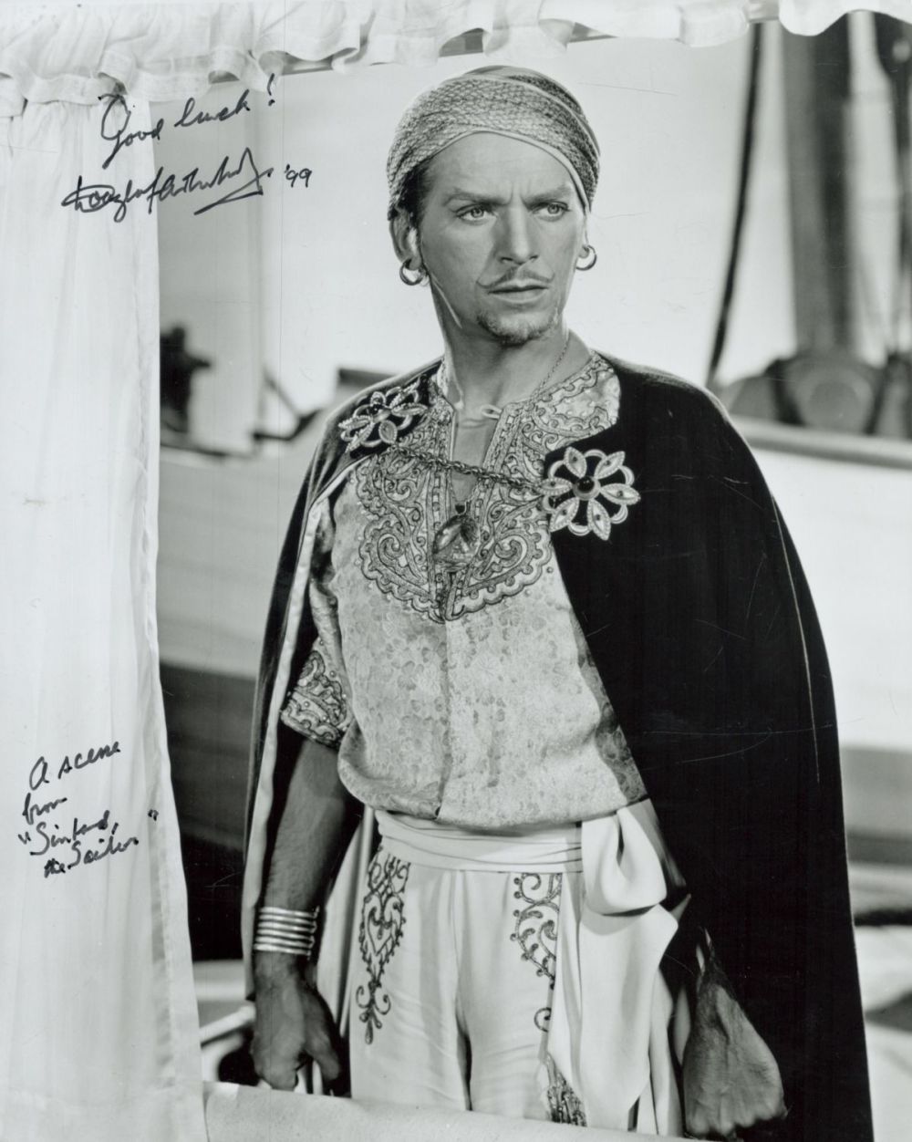Lot 487: Douglas Fairbanks Jr. signed 10x8 inch black and...