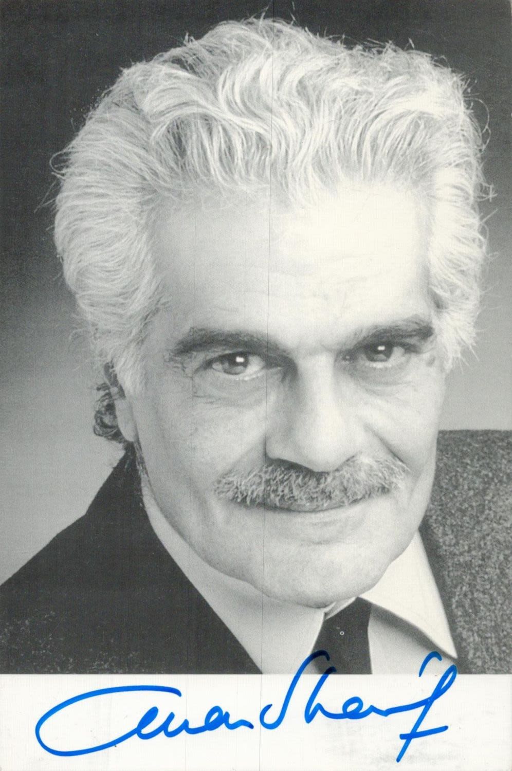 Lot 504: Omar Sharif signed 6x4 inch black and white...