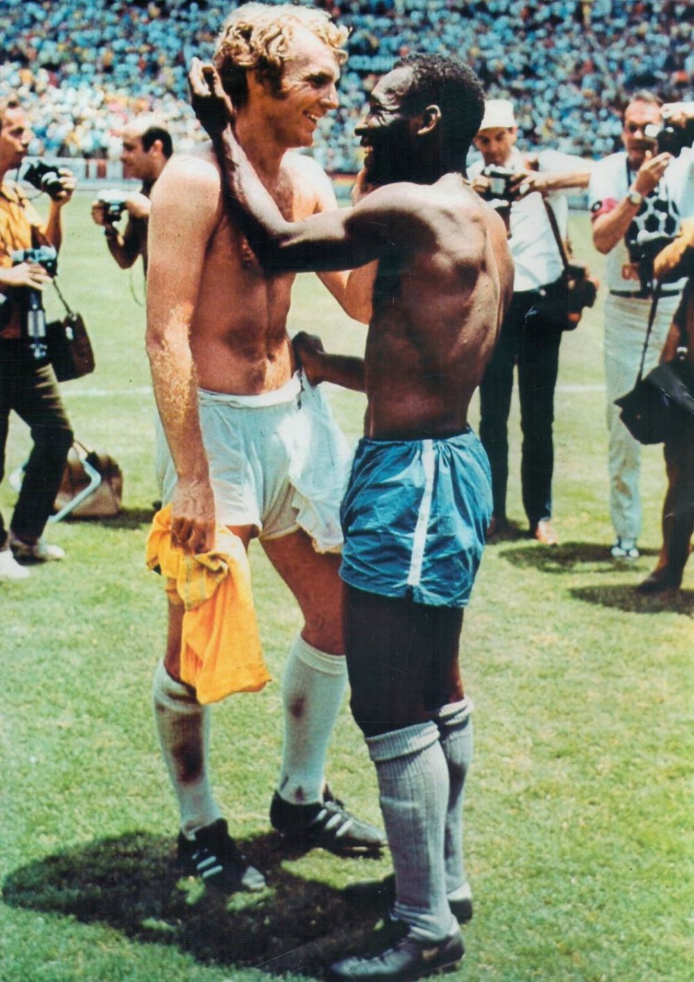 Lot 140: Footballer. Bobby Moore and Pelé Unsigned Colour Print...