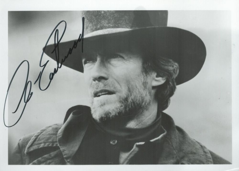 Lot 233: Clint Eastwood signed 7x5 inch black and white...