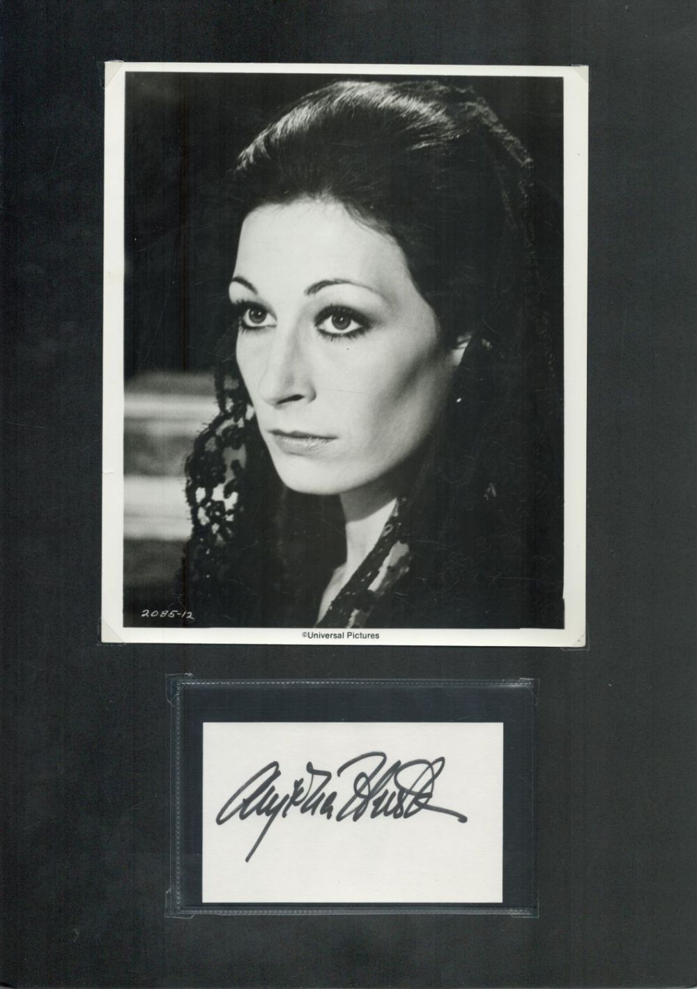 Lot 104: Anjelica Huston signed 16x12inch black and white mount....