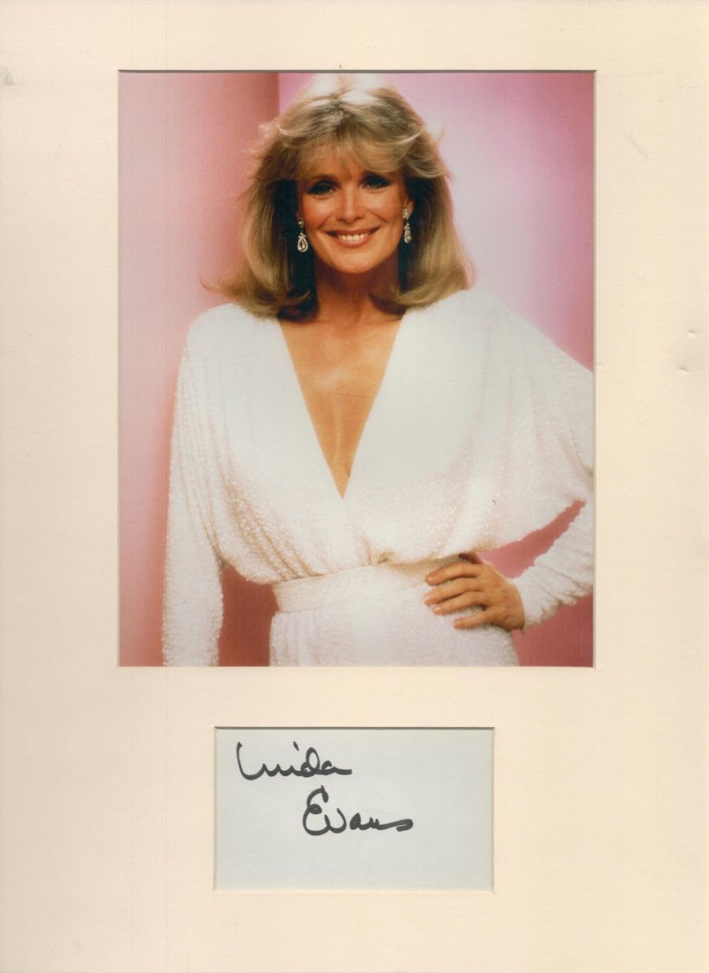 Lot 119: Linda Evans signed 16x12inch colour mount. Good Condition....