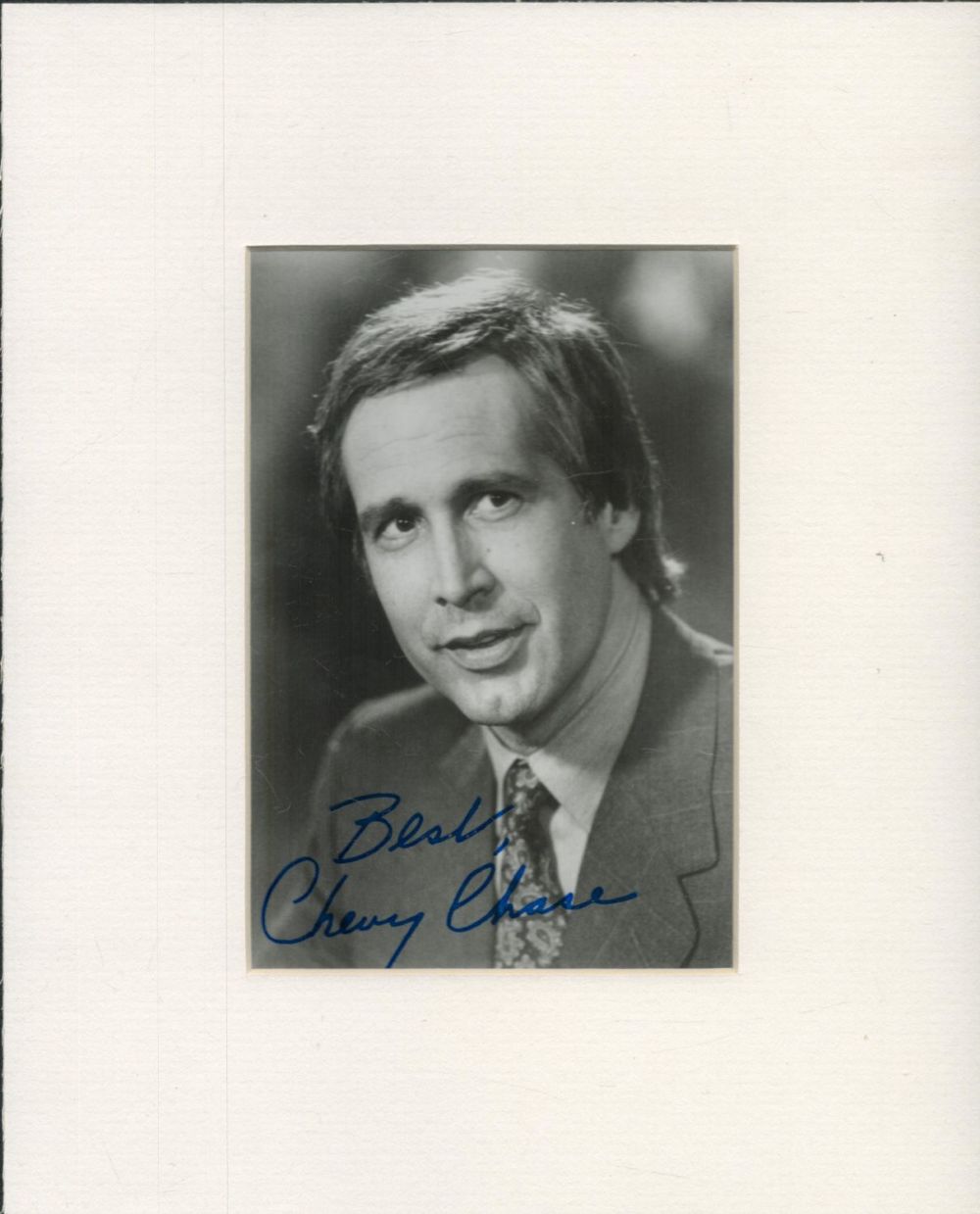 Lot 121: Chevy Chase 10x8inch black and white mount. Good...