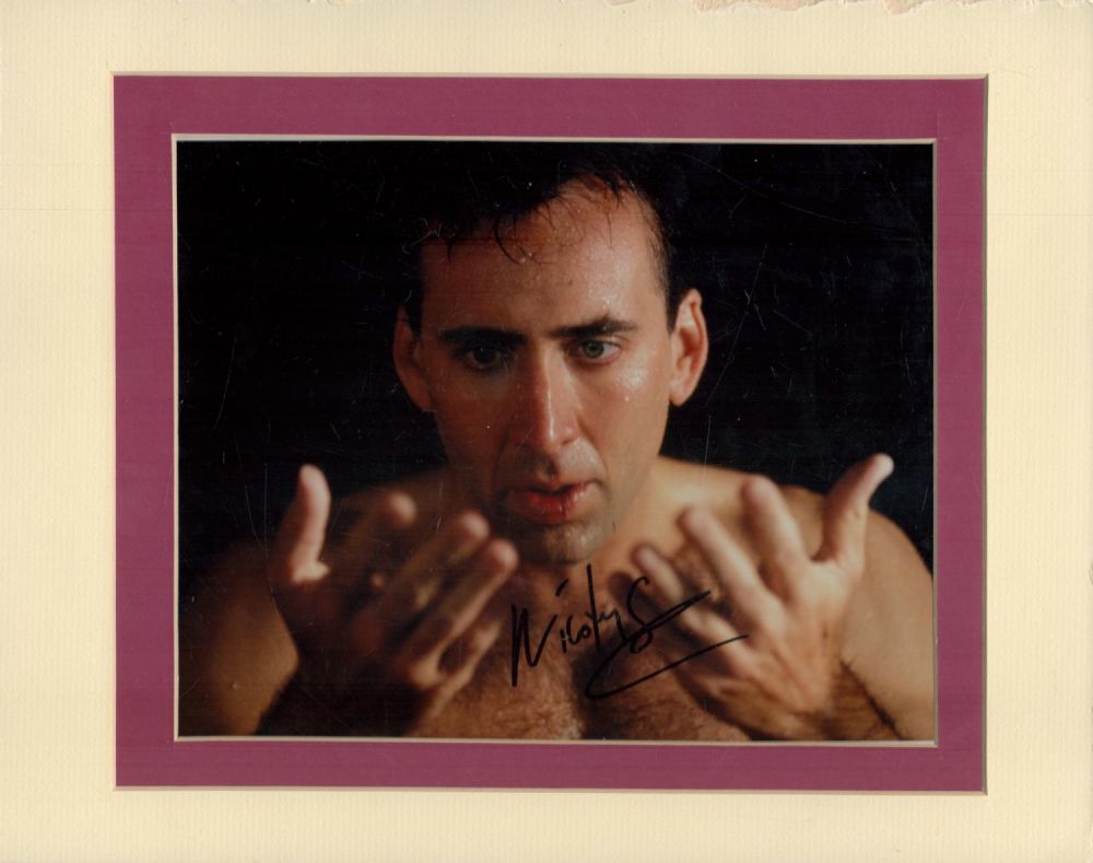Lot 134: Nicholas Cage signed 14x12inch colour mount. Good Condition....