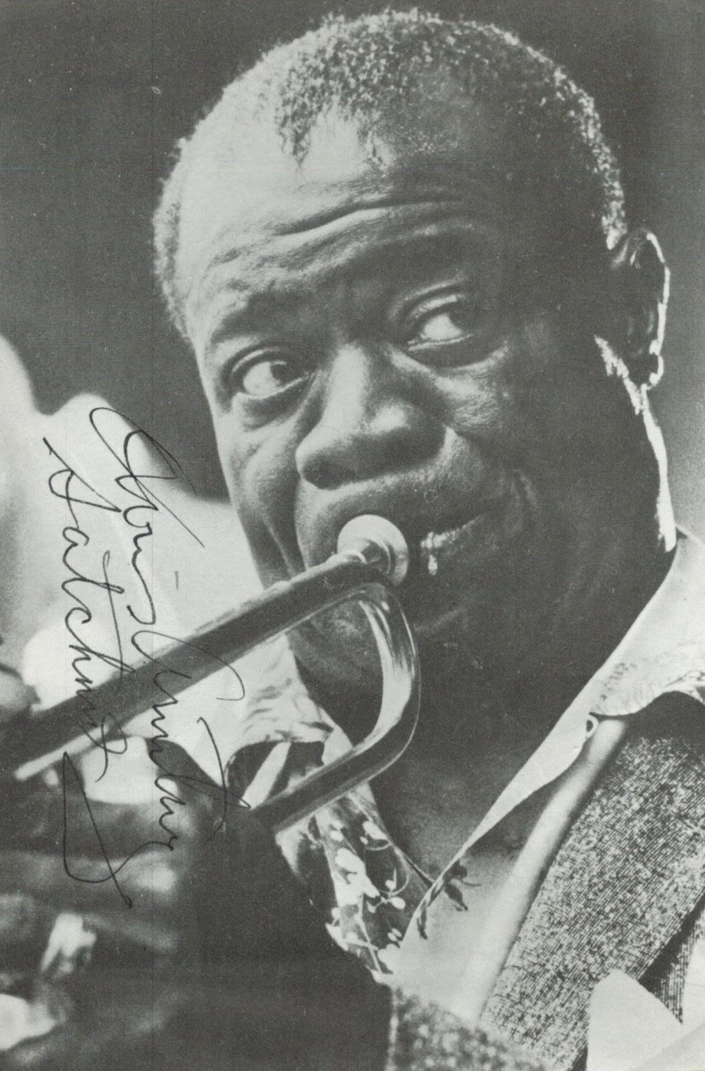 Lot 220: Louis Armstrong signed 7x5inch black and white magazine...