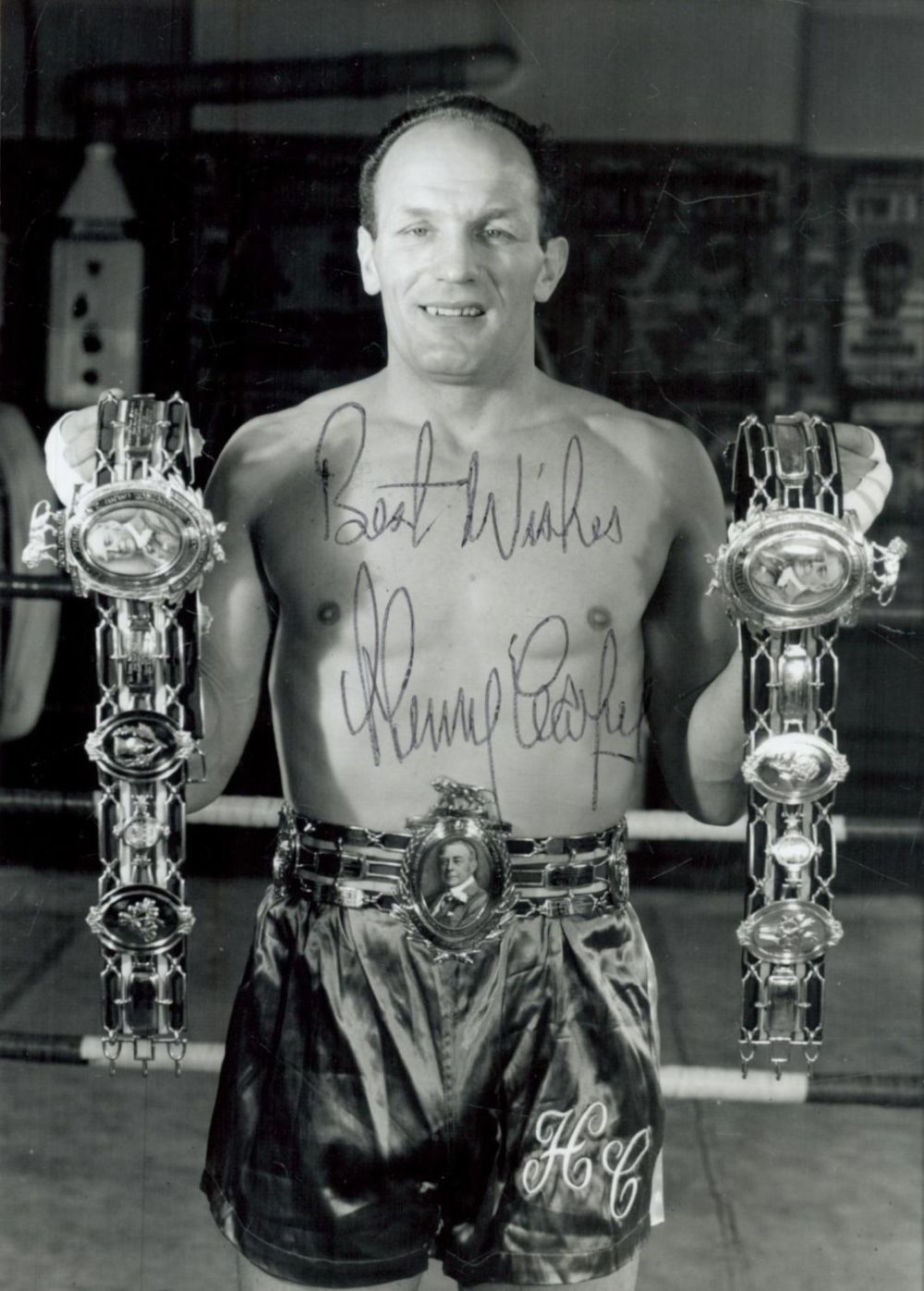 Lot 253: Henry Cooper signed 7x5 inch black and white...