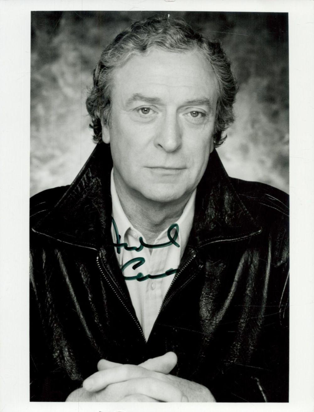 Lot 270: Michael Caine signed 9x7 inch black and white...