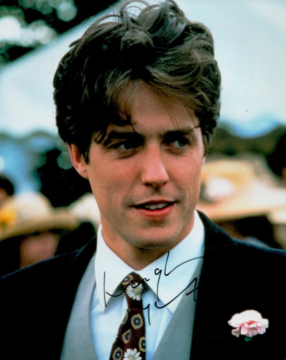 Lot 287: Hugh Grant signed 10x8 inch colour photo. Good...
