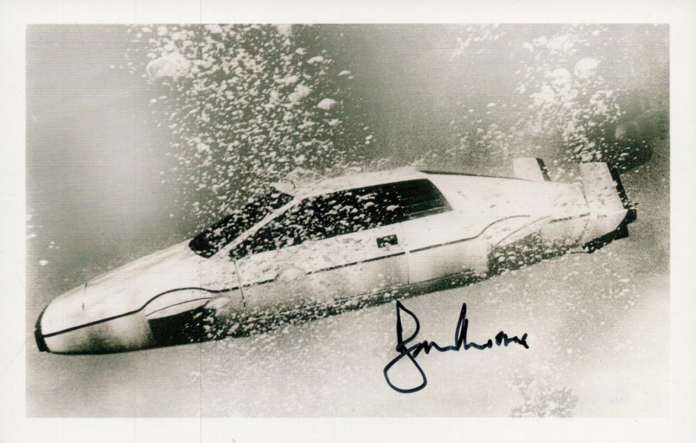 Lot 301: Roger Moore signed 6x4 inch black and white...