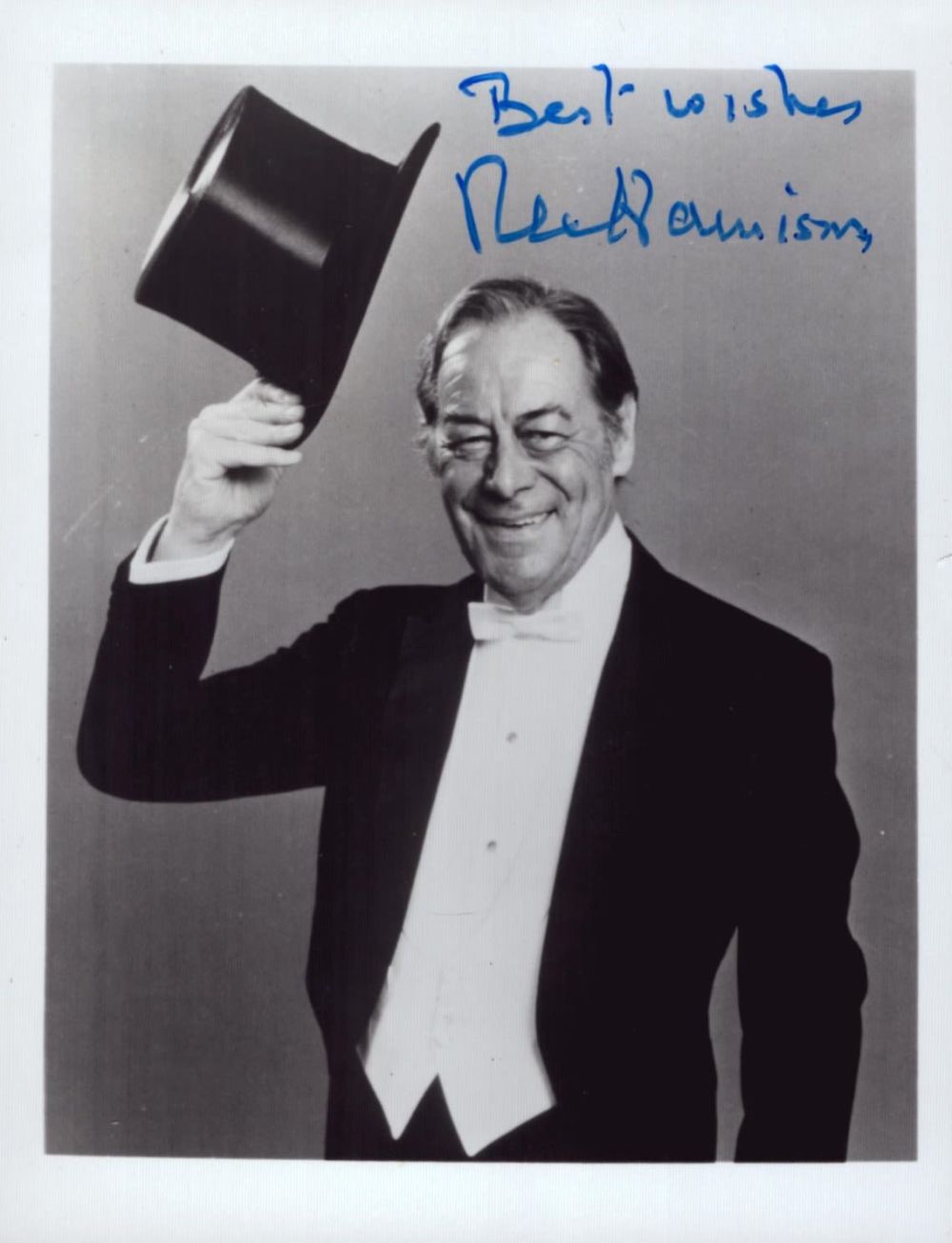 Lot 99: Rex Harrison signed 5x4inch black and white photo....
