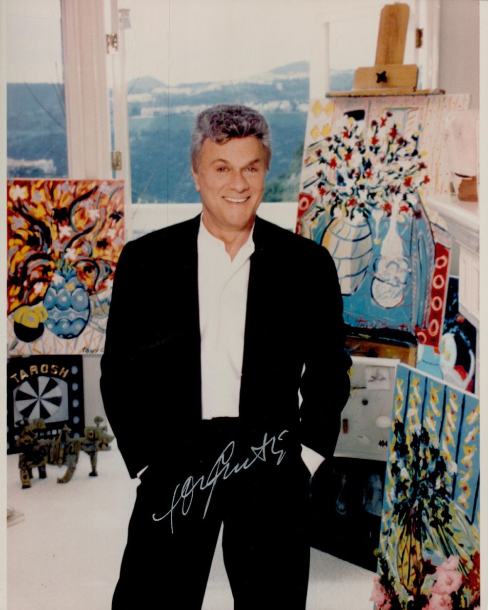 Lot 564: Tony Curtis signed 10x8 inch colour photo. Good...
