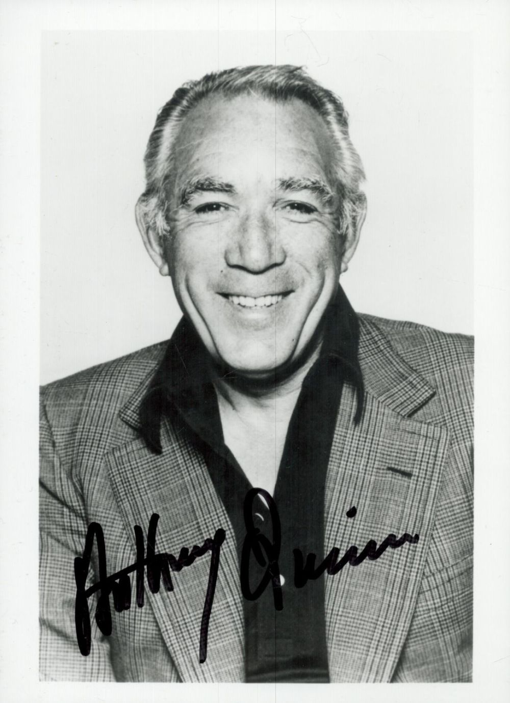 Lot 586: Anthony Quinn signed 7x5 inch black and white...