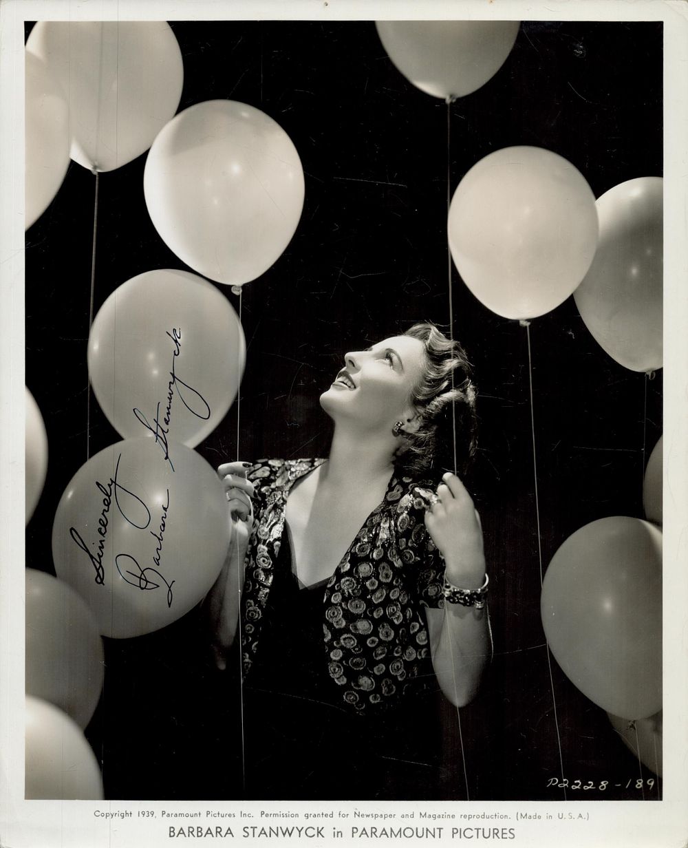 Lot 213: Barbara Stanwyck signed 10x8 inch vintage black and...