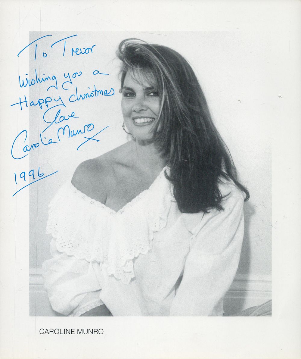 Lot 248: Caroline Munro signed 10x8 inch black and white...