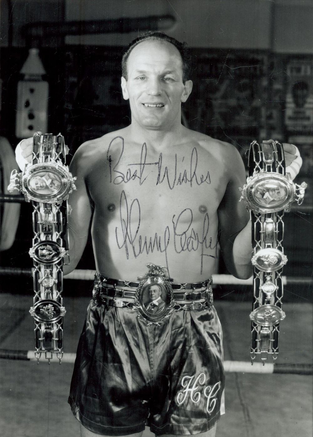 Lot 249: Henry Cooper signed 7x5 inch black and white...