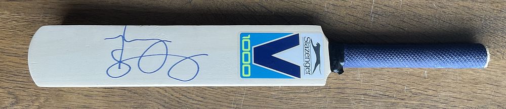 Lot 626: Cricket James Taylor signed Slazenger miniature cricket bat....