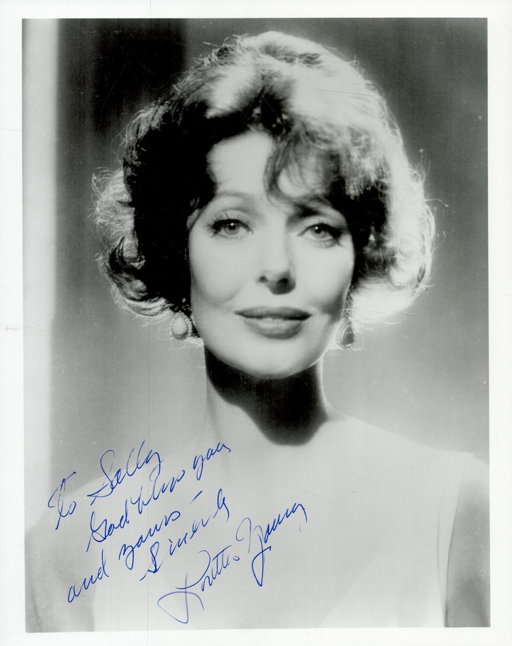 Lot 62: Loretta Young signed 10x8 inch black and white...