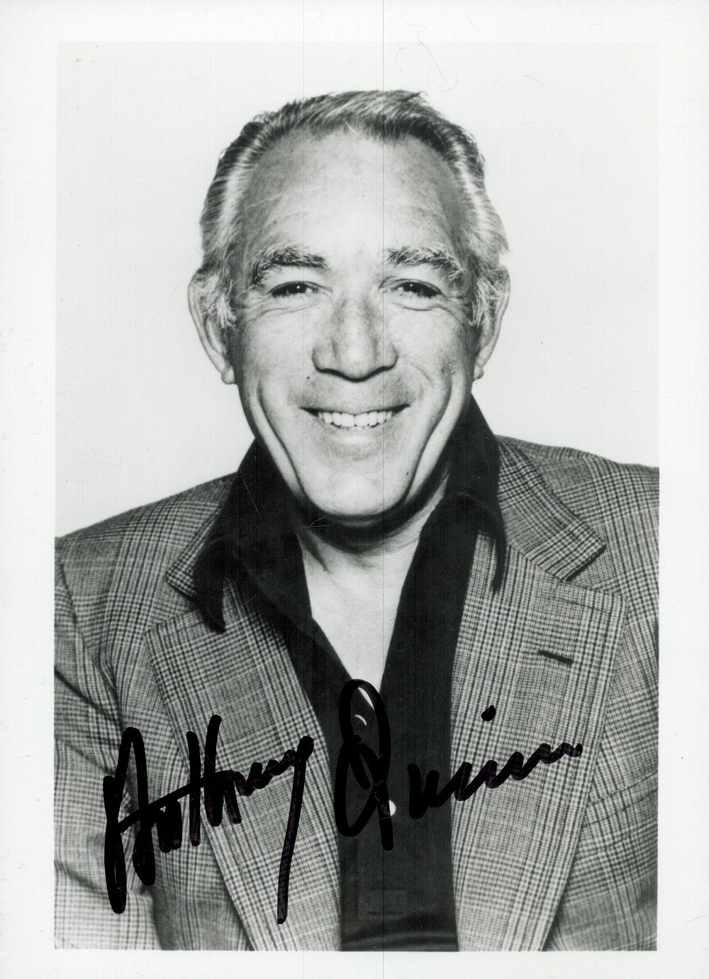 Lot 116: Anthony Quinn signed 7x5 inch black and white...