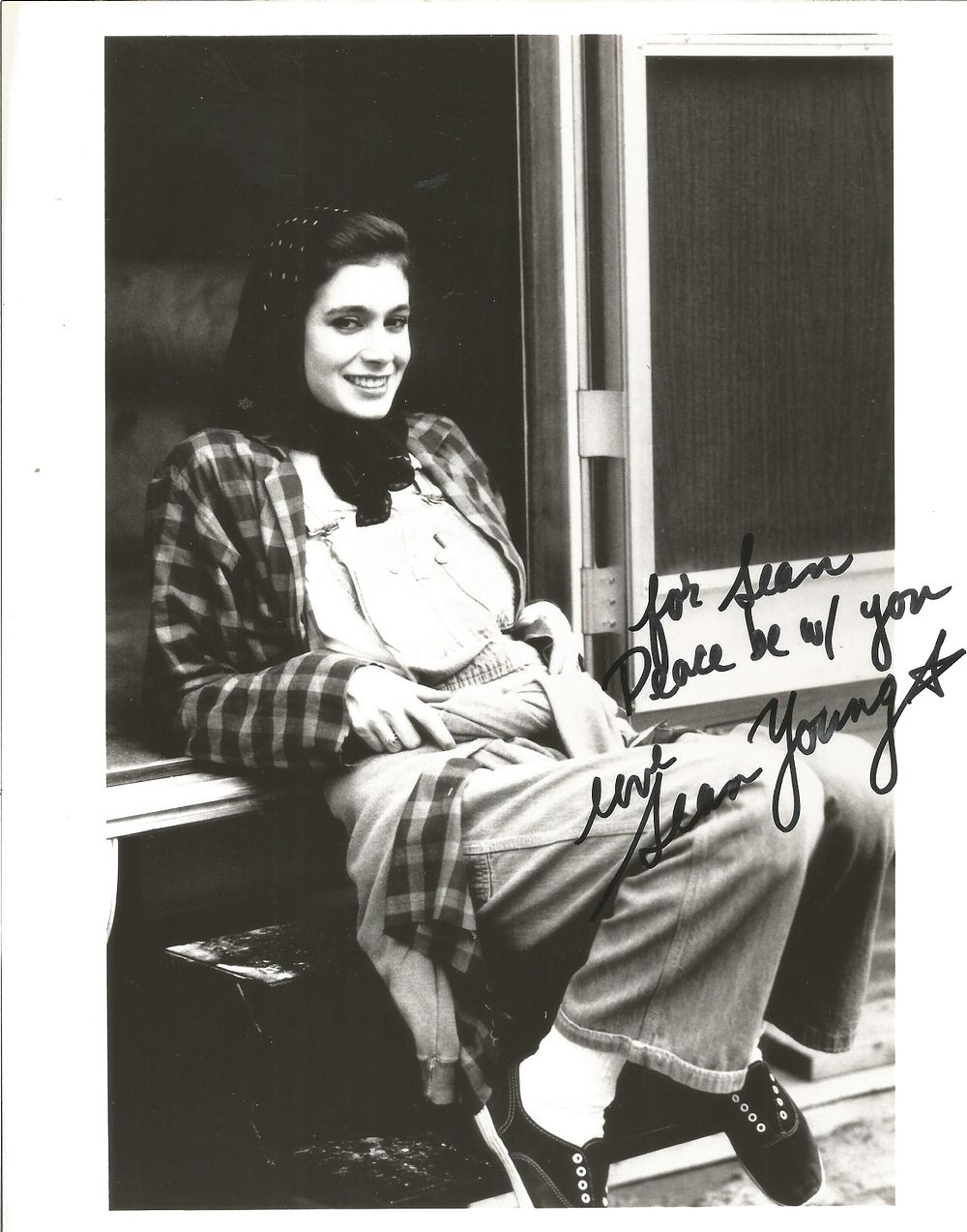 Lot 197: Sean Young signed 10x8 inch black and white...