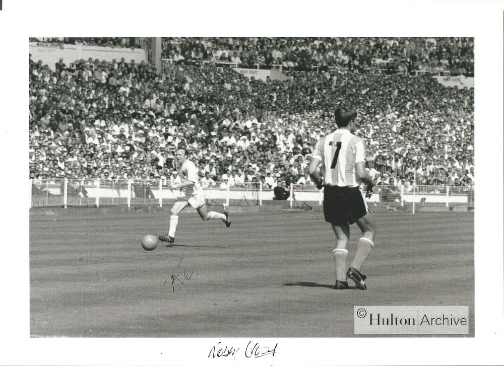 Lot 214: Nobby Stiles signed 12x8 inch black and white...
