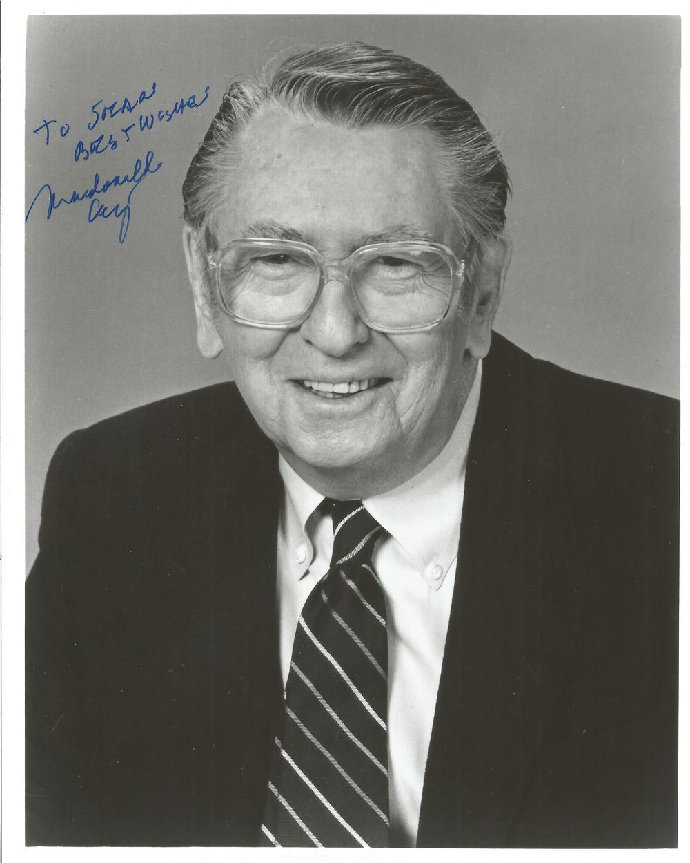 Lot 235: Macdonald Carey signed 10x8 inch black and white...