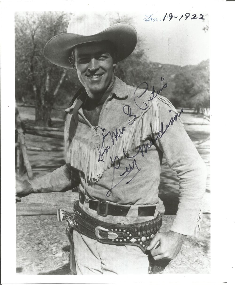 Lot 238: Guy Madison signed 10x8 inch black and white...