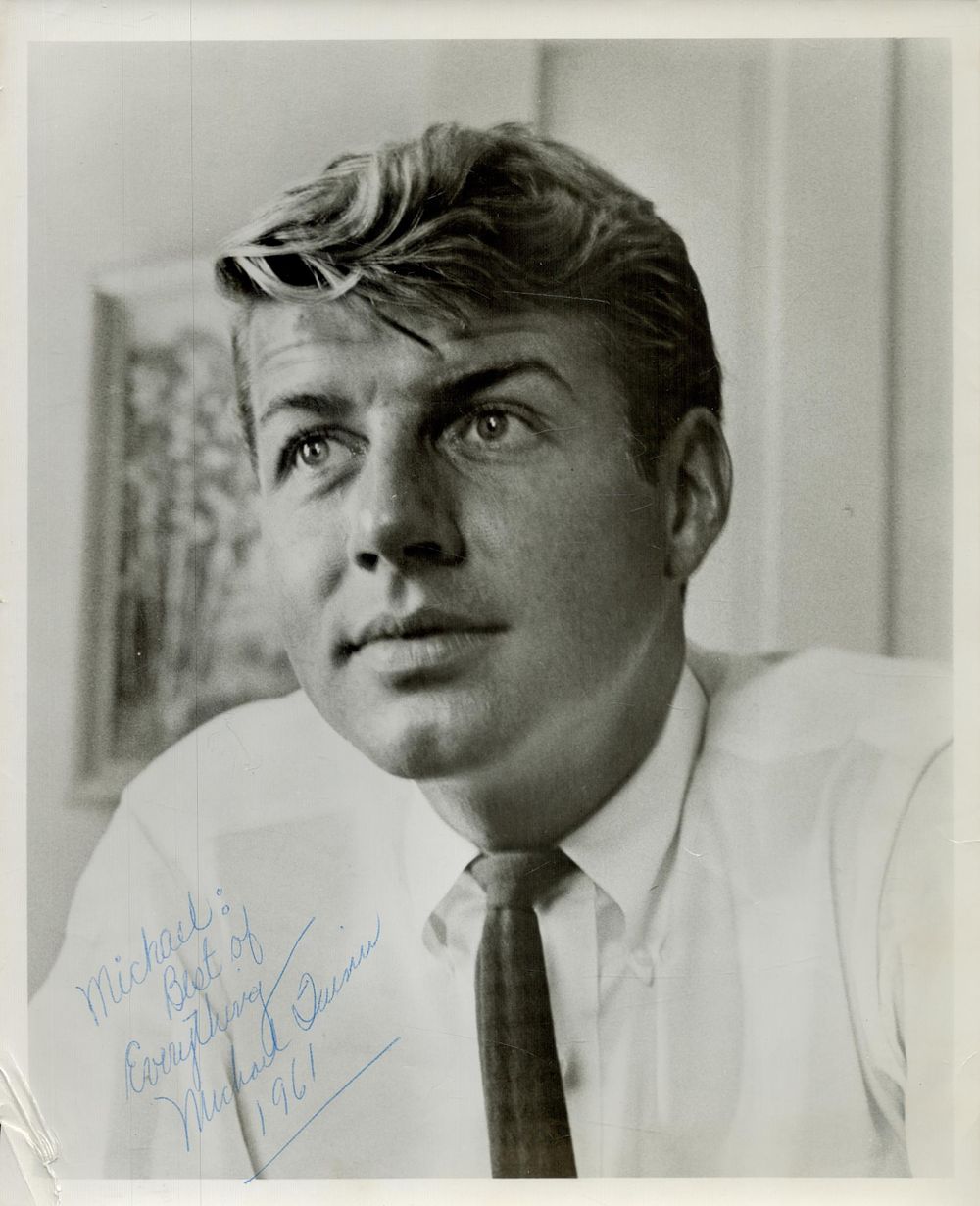 Lot 130: Michael Quinn signed 10x8 black and white photo....