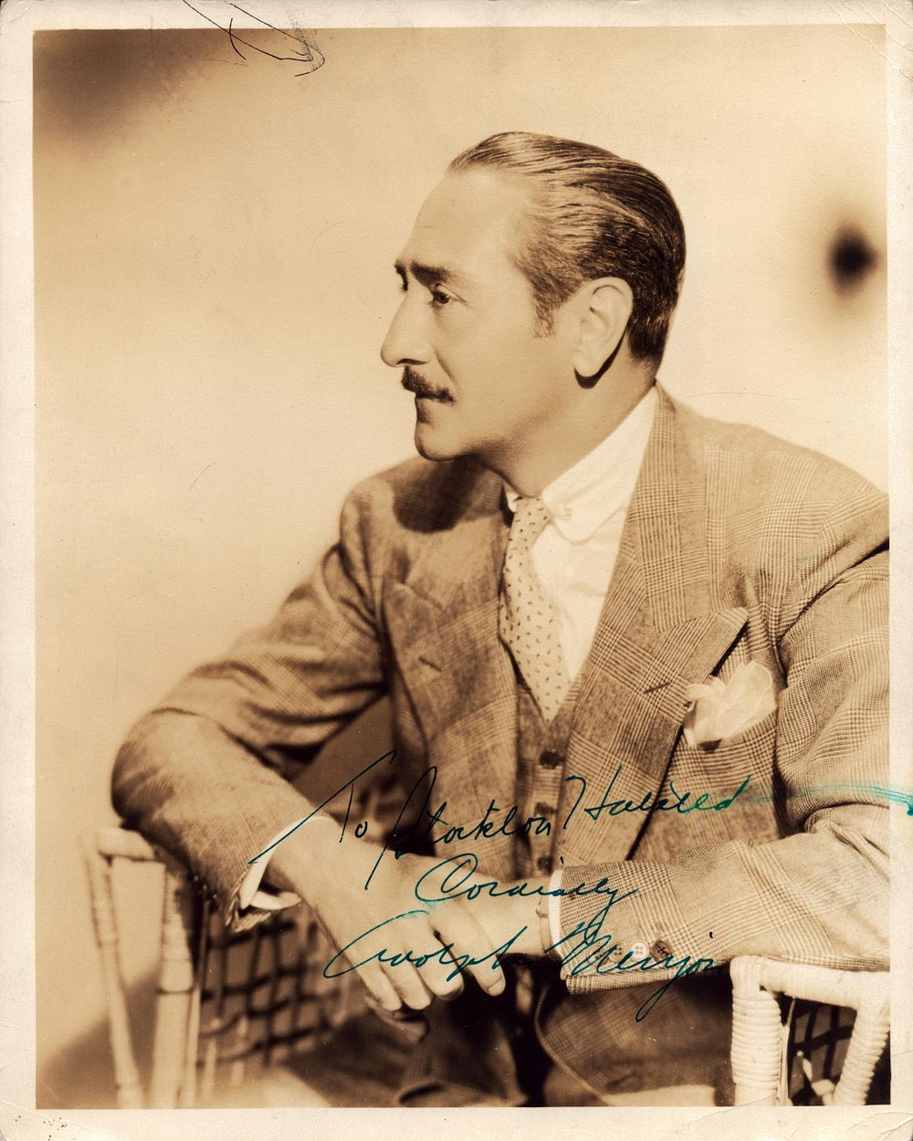 Lot 248: Adolphe Menjou signed 10x8 inch vintage sepia photo....