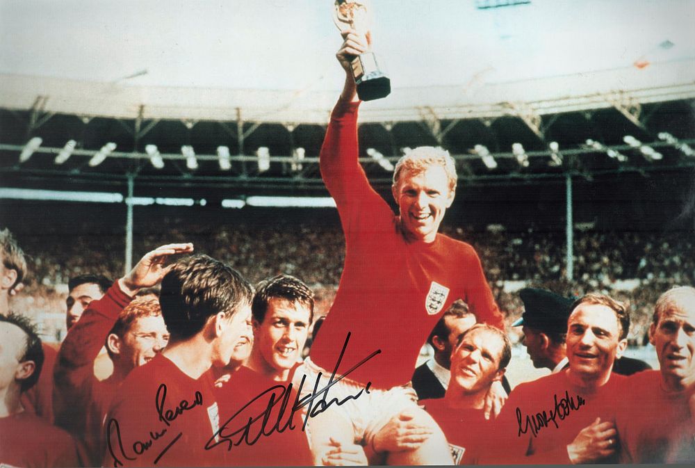 Lot 334: Geoff Hurst, Martin Peters and George Cohen signed...