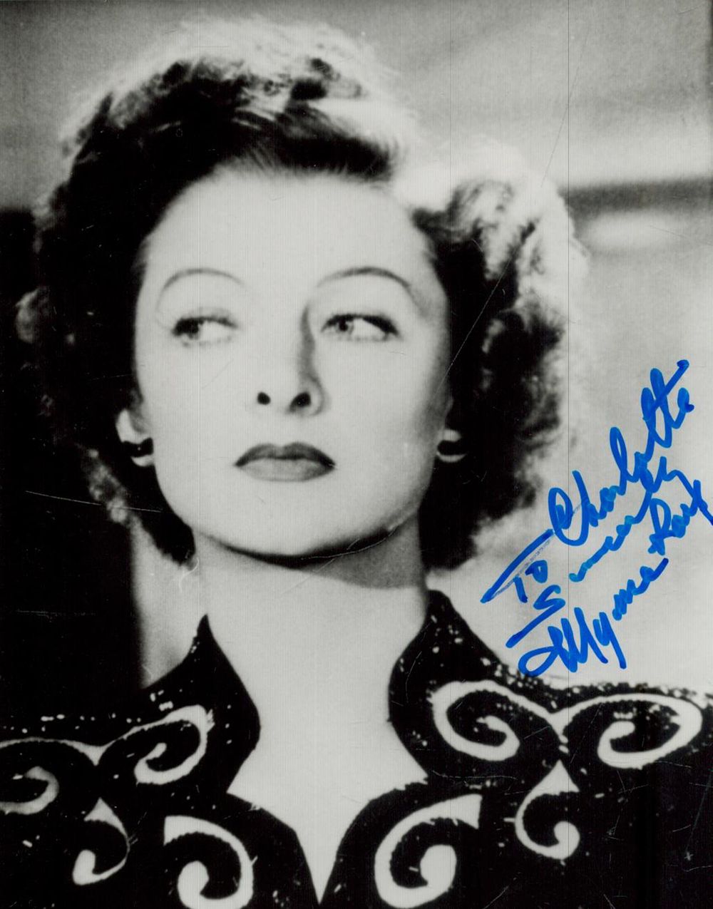 Lot 57: Myrna Loy (1905-1993), American actress. A signed and...